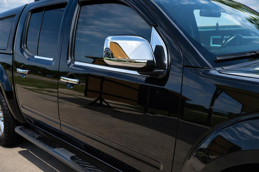 Wind deflector covers (2 pcs, stainless steel) for Nissan Navara 2006-2015 - image 1