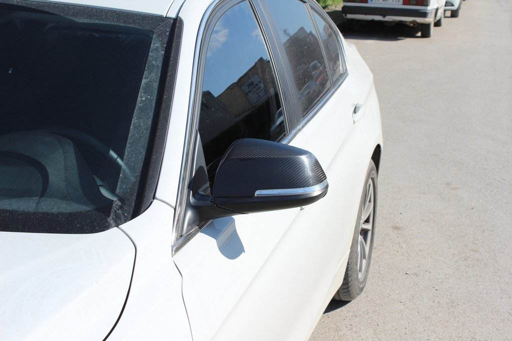 Covers for mirrors (2 pcs, natural carbon) for BMW 1 series F20/21 2011-2019 - Reelken Auto