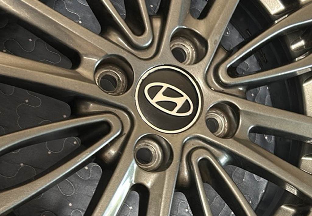 Wheel caps black hyun60tur-bl (59mm by 55mm, 4 pcs) for Hyundai - Reelken Auto