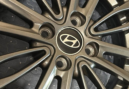 Wheel caps black hyun60tur-bl (59mm by 55mm, 4 pcs) for Hyundai - Reelken Auto