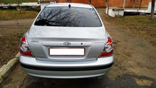 Chrome Tail Light Covers (2 pcs, plastic) for Hyundai Elantra (XD) 2000-2011 - image 1