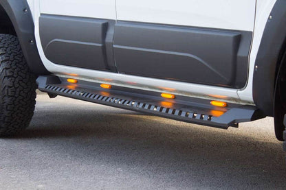 Side sills Dakar V1 with LED (2015-2019, 2 pcs, metal) for Mitsubishi L200 2015-2024 - Reelken Auto