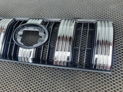 The chrome strips on the grille 2017↗︎ for Toyota Land Cruiser Prado 150 - Reelken Auto