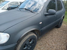 Fender flares (4 pcs, black, ABS plastic) for Mercedes ML W163 1997-2005 - image 1