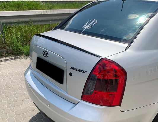 Spoiler LIP (Sunplex, black) (115.8cm x 6.3cm) for Hyundai Accent 2006-2010 - image 1