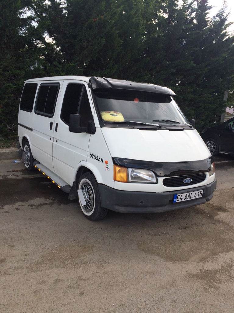The visor on the windshield (gloss black, 5mm) for Ford Transit 1991-2000 - Reelken Auto