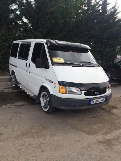 The visor on the windshield (gloss black, 5mm) for Ford Transit 1991-2000 - Reelken Auto