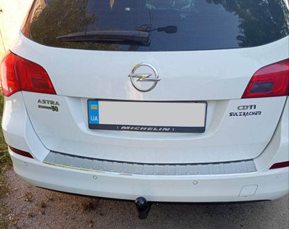 Cover on the rear bumper V-1 Carmos (SW, stainless steel) for Opel Astra J 2009-2015 - Reelken Auto