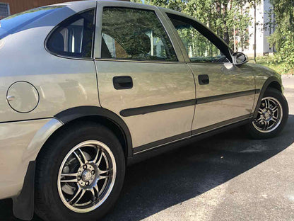 Fender flares (4 pcs, black) for Opel Vectra B 1995-2002 - image 1