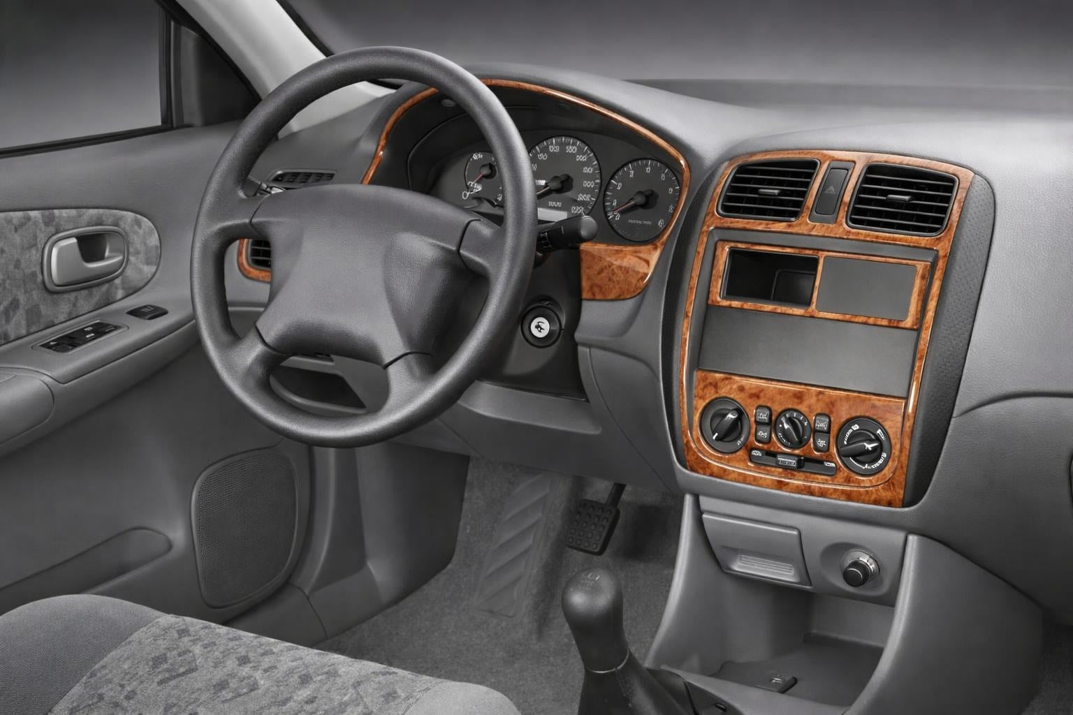 Dashboard Trim Covers (2000-2004) for Mazda 323 1977-2003 - image 1