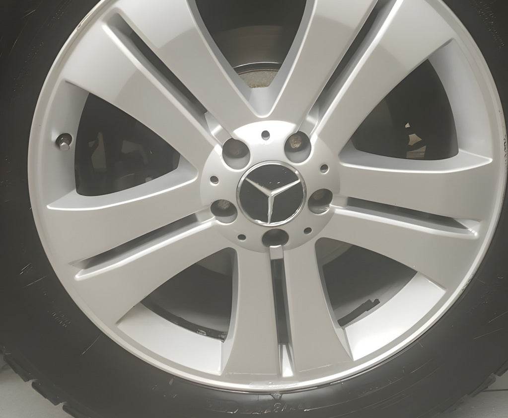 Wheel caps 70/75 mm with a ring (4 pcs., black) for Mercedes - Reelken Auto