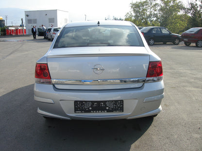 Rear lower trim Sedan (primed for painting) for Opel Astra H 2004-2013 - image 1