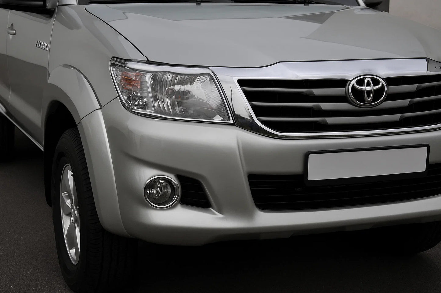 Headlight covers (2 pcs, plastic) for Toyota Hilux 2006-2015 - image 1