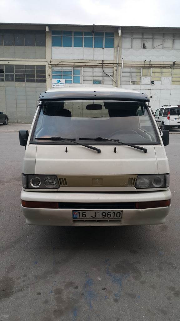 The visor on the windshield for Mitsubishi L300 - Reelken Auto