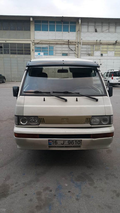 The visor on the windshield for Mitsubishi L300 - Reelken Auto