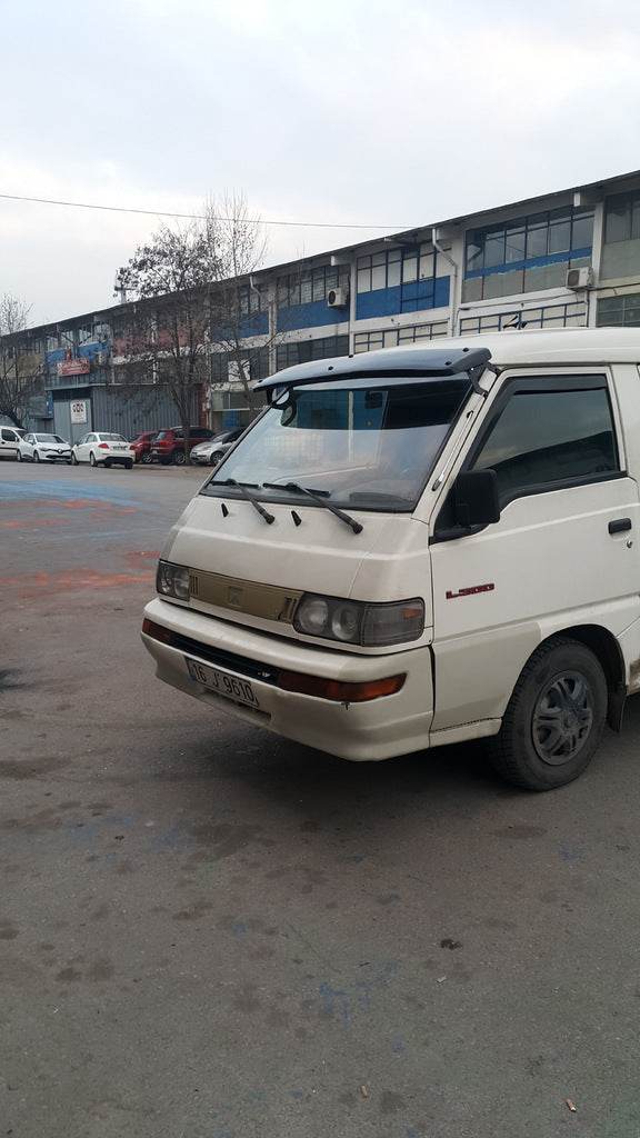 The visor on the windshield for Mitsubishi L300 - Reelken Auto