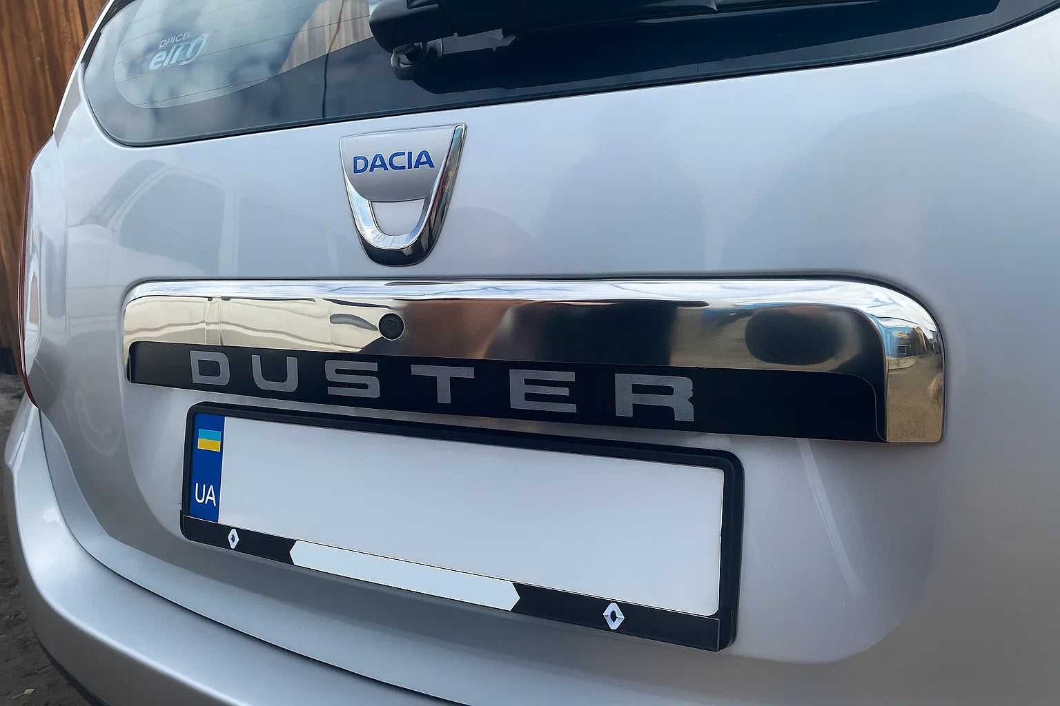 Upper stainless steel trim above license plate for Renault Duster 2008-2017 - image 1