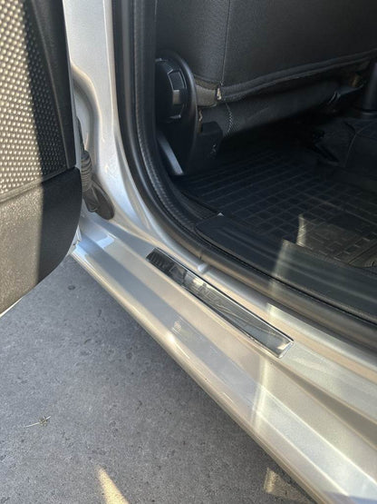 Door sill plates Carmos V1 (4 pcs., stainless steel) for Fiat Linea 2006-2018 - Reelken Auto