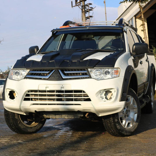 Cover on the hood V1 (ABS) for Mitsubishi L200 2006-2015 - Reelken Auto