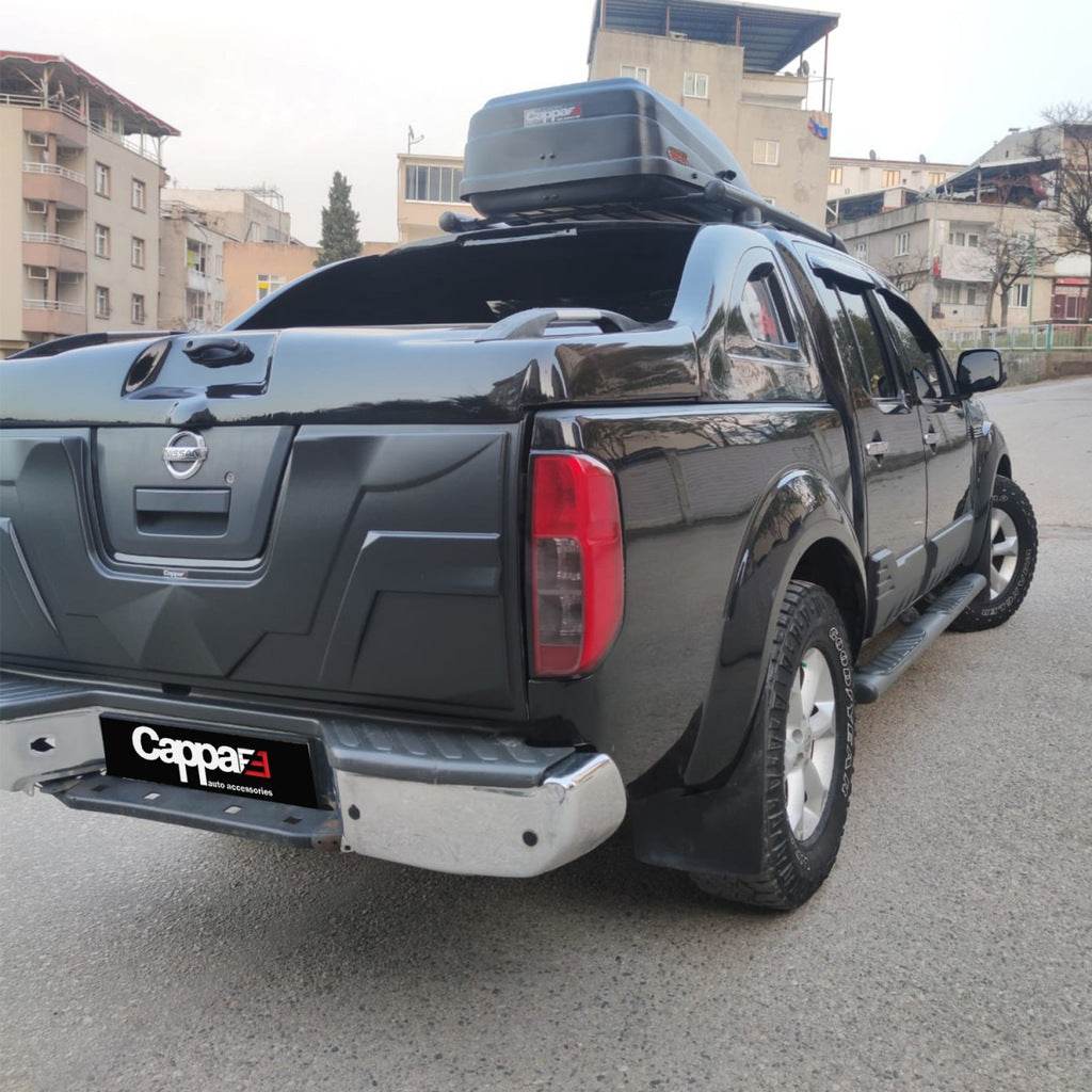 Cover on the trunk lid (ABS) for Nissan Navara 2006-2015 - Reelken Auto