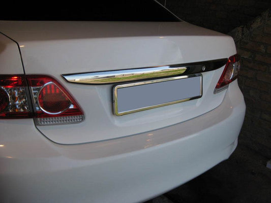 Cover over the number 2010-2013 (stainless) for Toyota Corolla 2007-2013 - Reelken Auto