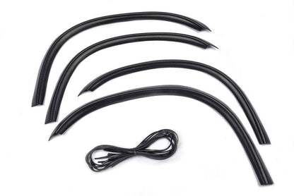 The pads on the arches (4 pieces, plastic) for Volkswagen T4 Caravelle/Multivan - Reelken Auto