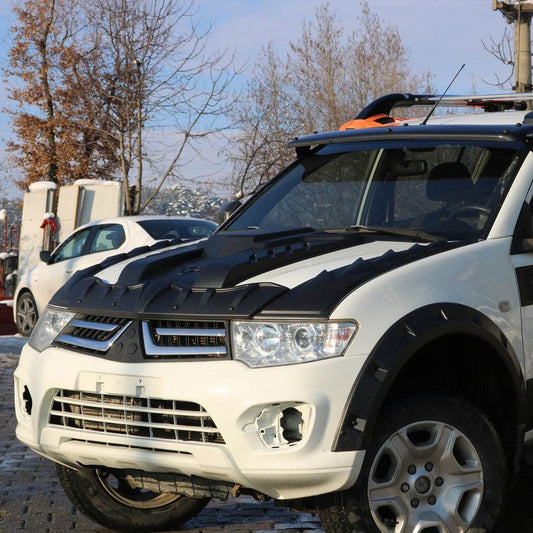 Cover on the hood V1 (ABS) for Mitsubishi L200 2006-2015 - Reelken Auto