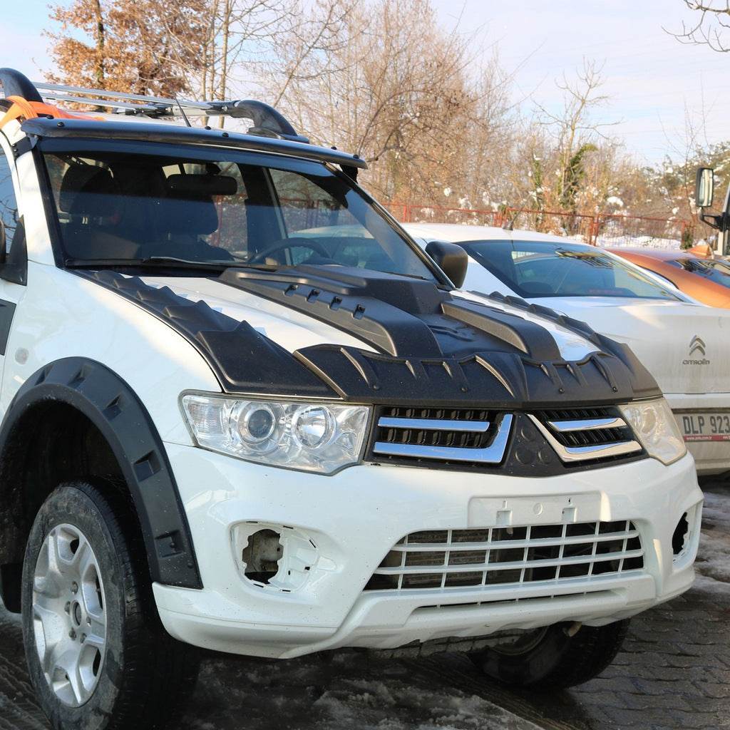 Cover on the hood V1 (ABS) for Mitsubishi L200 2006-2015 - Reelken Auto