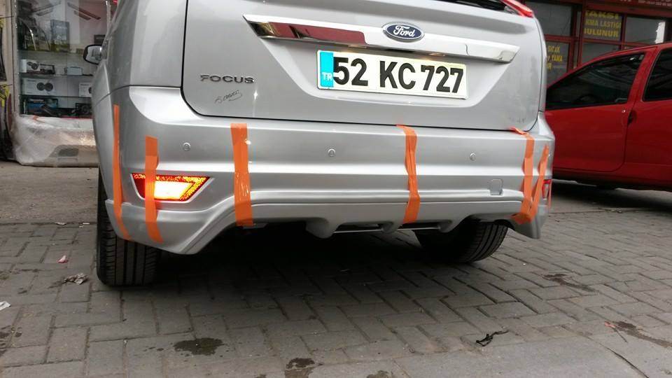 Cover on the rear bumper Sedan (for painting) for Ford Focus II 2008-2011 - Reelken Auto