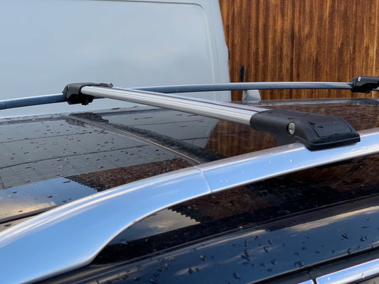 Poperechny on the roof rails under the key (2 PCs) for Volkswagen Passat B6 2006-2012 - image 1
