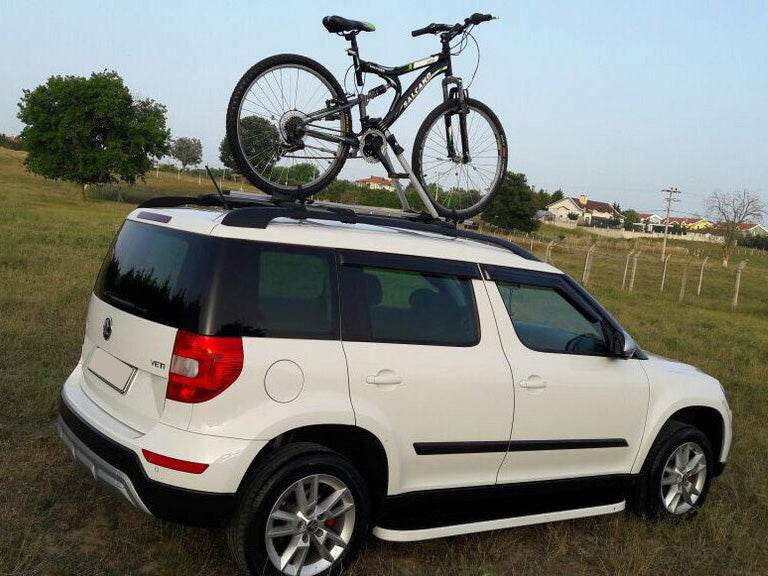 Attachment for a bicycle (on transverse arches) - Reelken Auto
