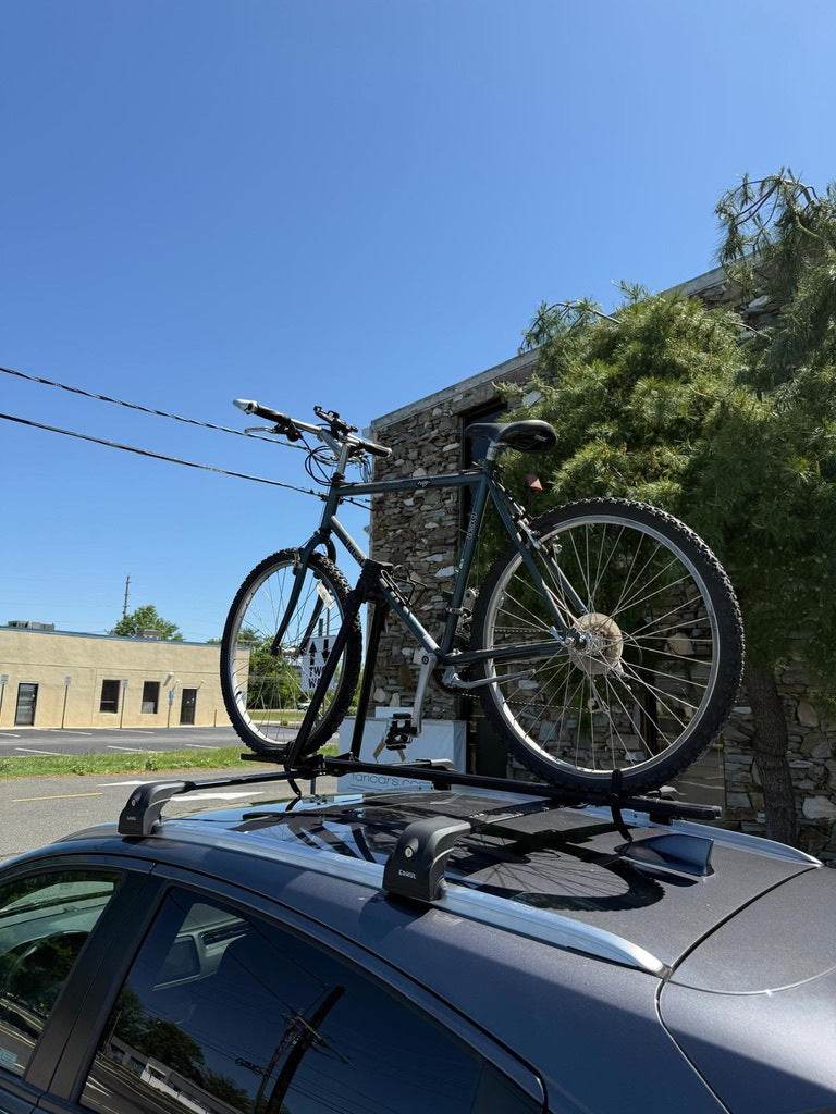 Attachment for a bicycle (on transverse arches) - Reelken Auto