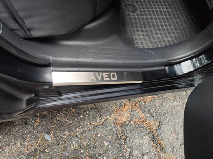 Pads for door sills Carmos (4 pieces, stainless.) for Chevrolet Aveo T250 2005-2011 - Reelken Auto