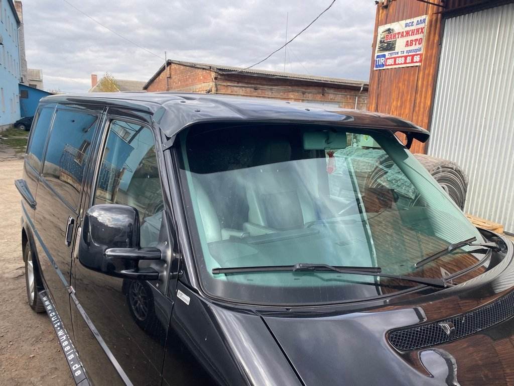 The visor on the windshield (on the brackets) for Volkswagen T4 Transporter - Reelken Auto