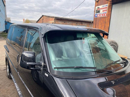 The visor on the windshield (gloss black, 5mm) for Volkswagen T4 Caravelle/Multivan - Reelken Auto