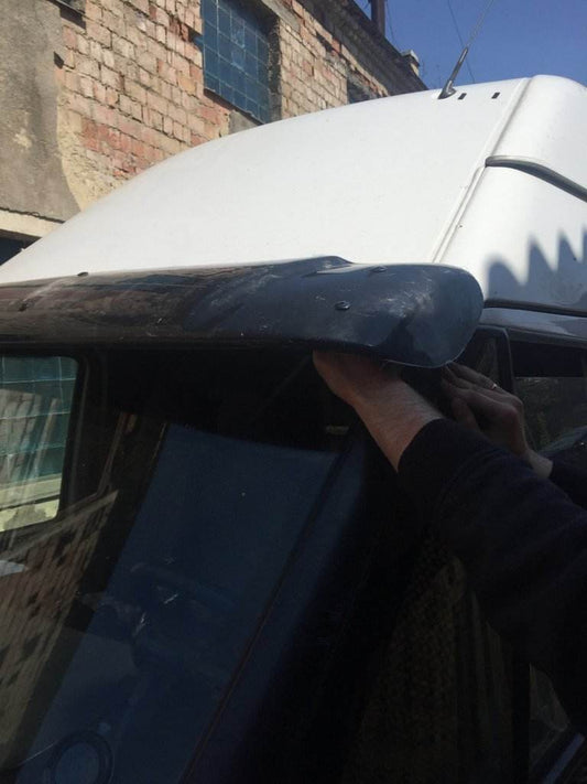 The visor on the windshield (gloss black, 5mm) for Ford Transit 2000-2014 - Reelken Auto