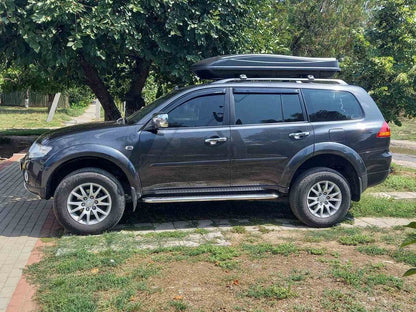 Lateral platforms Maydos V2 (2 PCs., aluminium ↗ stainless) for Mitsubishi Pajero Sport 2008-2015 - Reelken Auto
