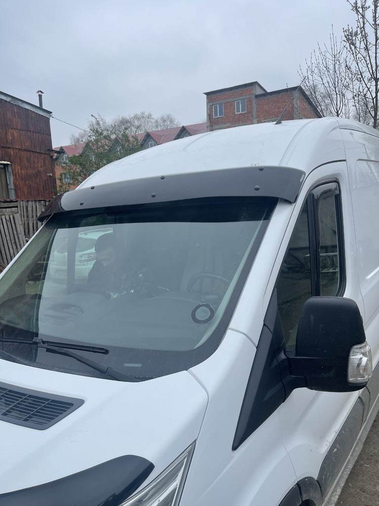 The visor on the windshield (gloss black, 5mm) for Ford Transit 2014↗ - Reelken Auto