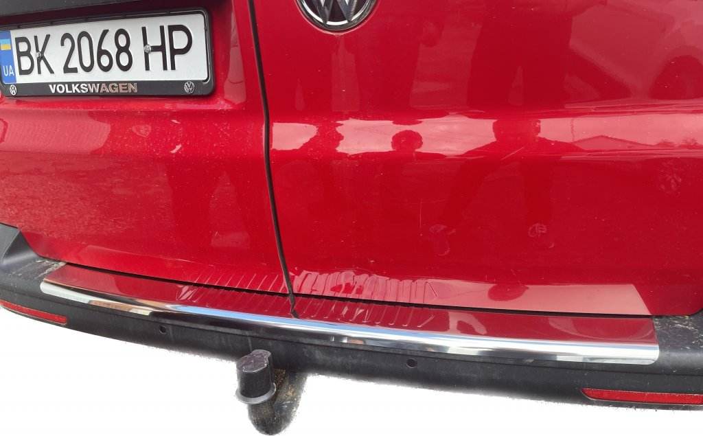 Cover on the rear bumper with a bend (Carmos V1, steel) for Volkswagen T5 Caravelle 2004-2010 - Reelken Auto