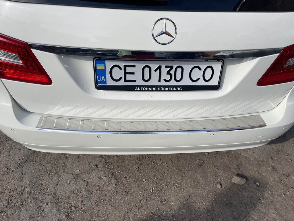 Cover on the rear bumper Carmos (SW, stainless steel) for Mercedes E-class W211 2002-2009 - Reelken Auto