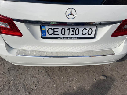 Cover on the rear bumper Carmos (SW, stainless steel) for Mercedes E-class W211 2002-2009 - Reelken Auto