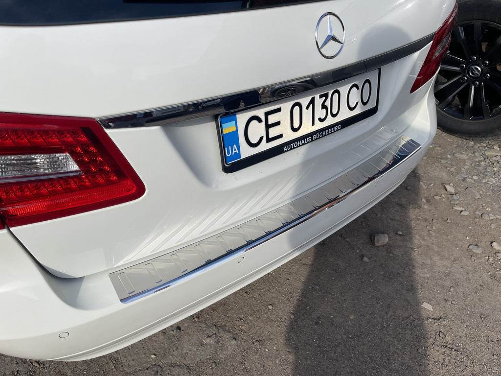 Cover on the rear bumper Carmos (SW, stainless steel) for Mercedes E-class W211 2002-2009 - Reelken Auto