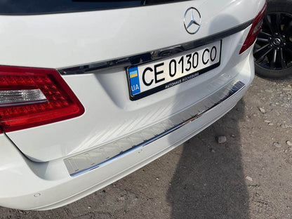 Cover on the rear bumper Carmos (SW, stainless steel) for Mercedes E-class W211 2002-2009 - Reelken Auto