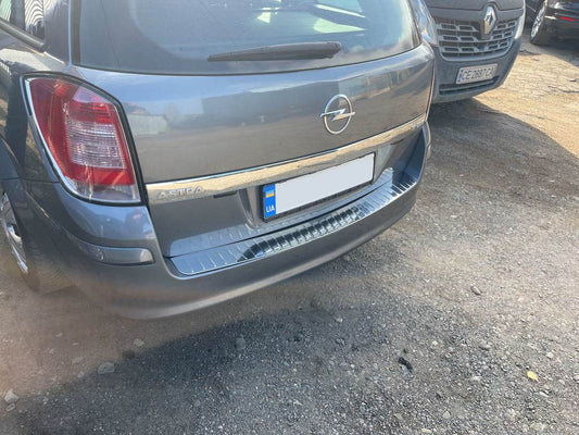 Cover on the rear bumper OmsaLine gloss (SW, stainless steel) for Opel Astra H 2004-2013 - Reelken Auto