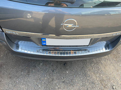 Cover on the rear bumper OmsaLine gloss (SW, stainless steel) for Opel Astra H 2004-2013 - Reelken Auto