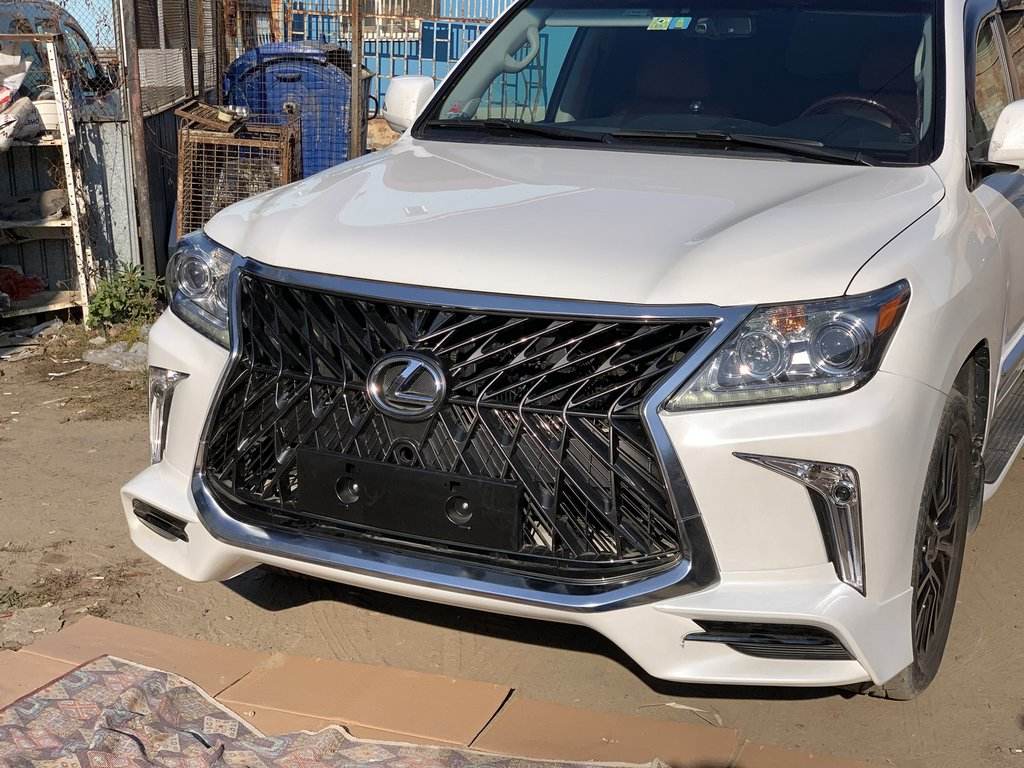 Front bumper for 2008-2015 in the style of restyling (for painting) for Lexus LX570/450d - Reelken Auto