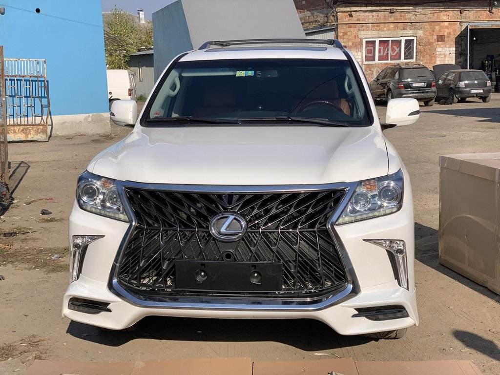 Front bumper for 2008-2015 in the style of restyling (for painting) for Lexus LX570/450d - Reelken Auto
