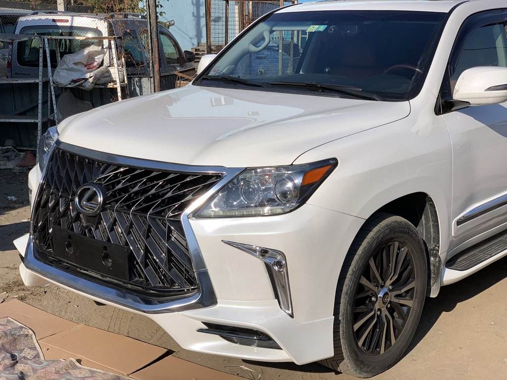 Front bumper for 2008-2015 in the style of restyling (for painting) for Lexus LX570/450d - Reelken Auto