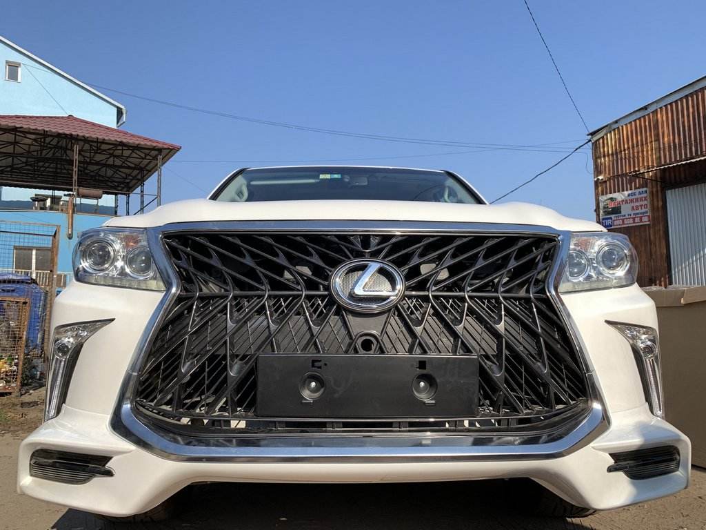 Front bumper for 2008-2015 in the style of restyling (for painting) for Lexus LX570/450d - Reelken Auto
