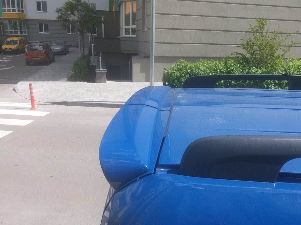 Anatomic spoiler (Hinged doors, paintable) for Citroen Nemo - Reelken Auto